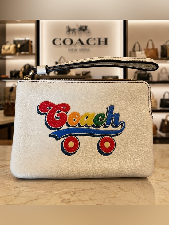 Coach Handbags - Coach White Leather Wristlet with Rainbow Logo EUC